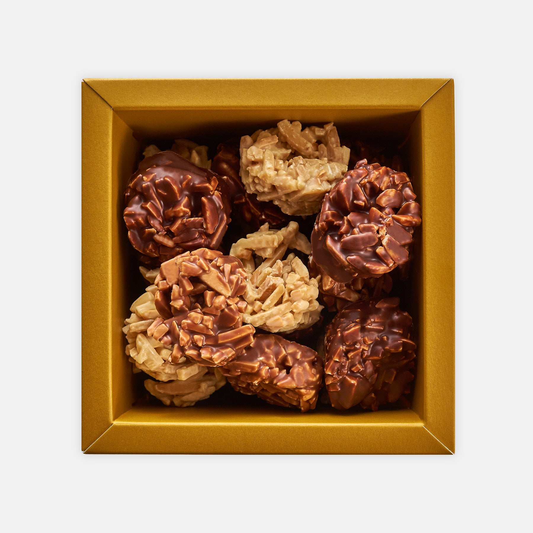 Roasted almonds coated with milk, dark and white chocolate - ghraoui-chocolate